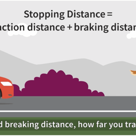 a woman standing next to a red car